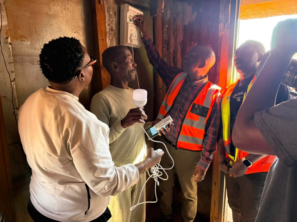 Cllr Frans Boshielo in one of the zone 14 residents house